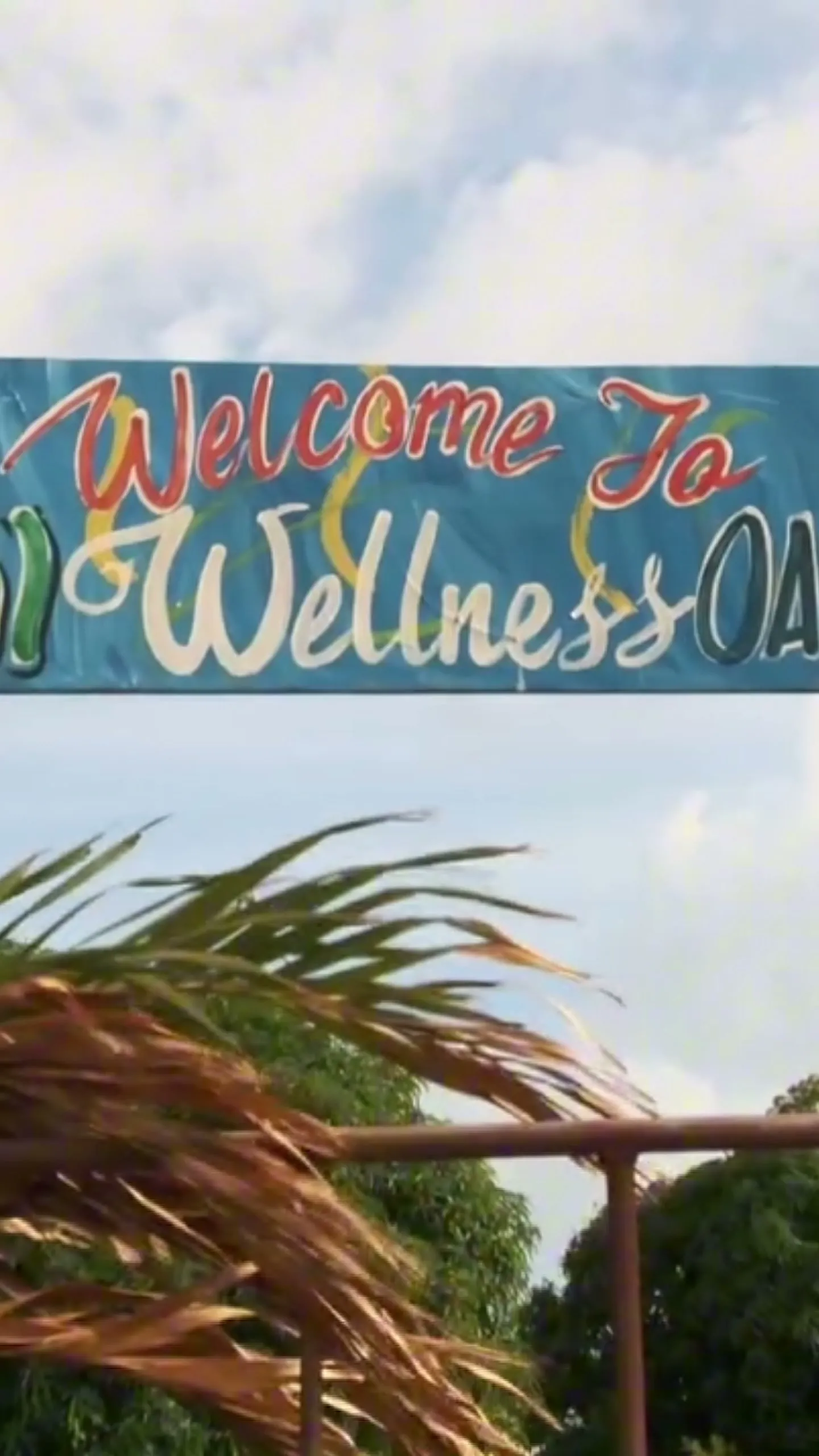 The Welcome to YAI Wellness Oasis sign